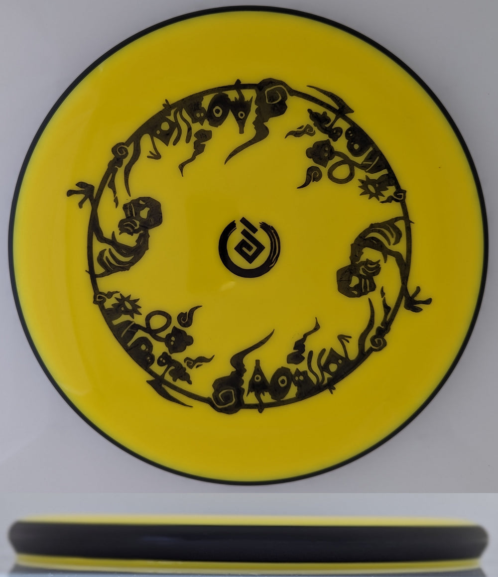 Yellow MVP Glitch disc with circular black Hyakki Yagyo Night Parade of 100 Demons design and black Yokai Disc logo 